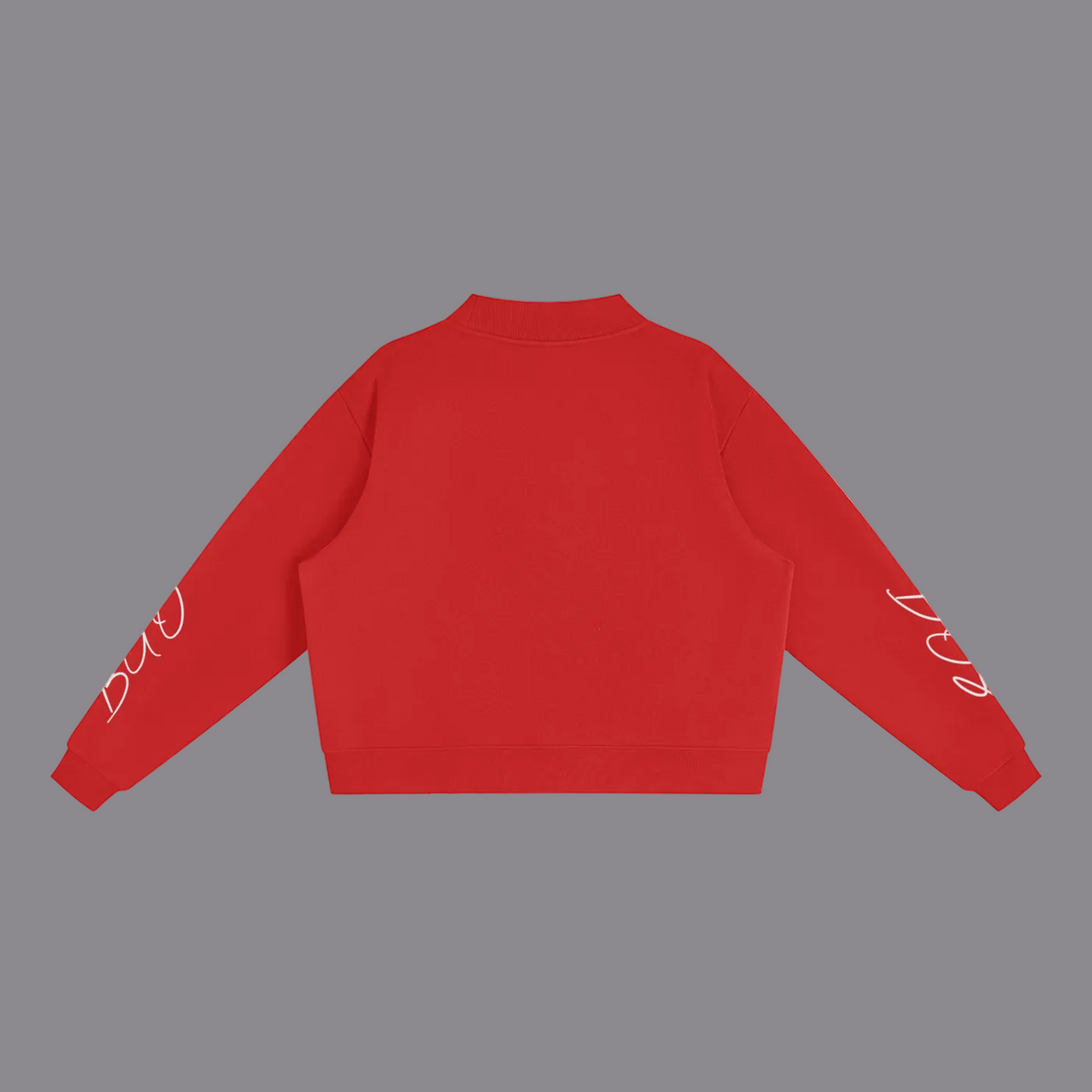 A red cropped sweatshirt shown from the back, featuring white cursive script graphics printed on both sleeves, displayed against a solid white background.